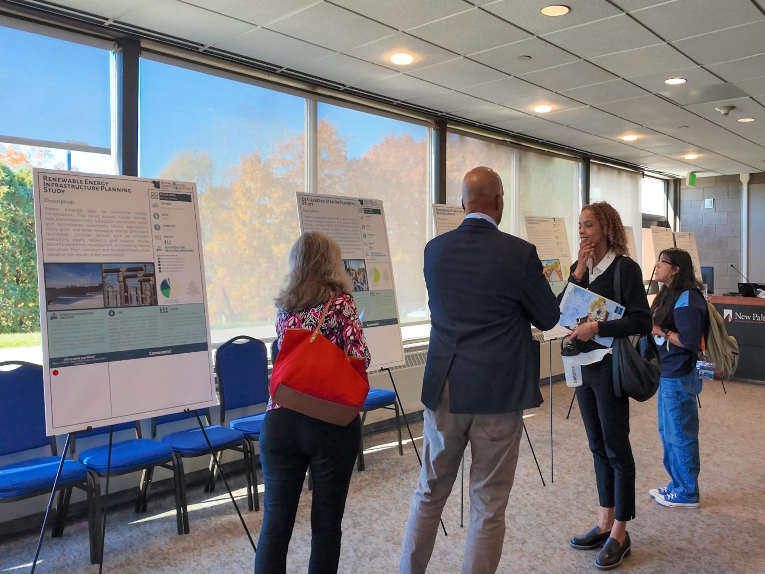 Residents leave feedback at a public meeting for a new Community Climate Action Plan